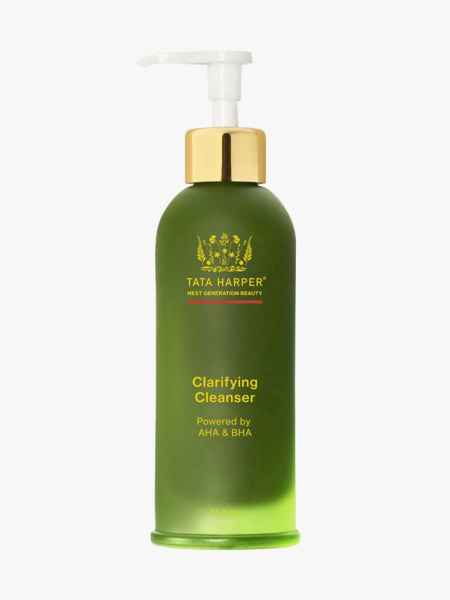 Tata Harper Clarifying Pore & Oil Control Cleanser with BHA & AHA for Redness in branded green bottle component with gold accents on a light gray background